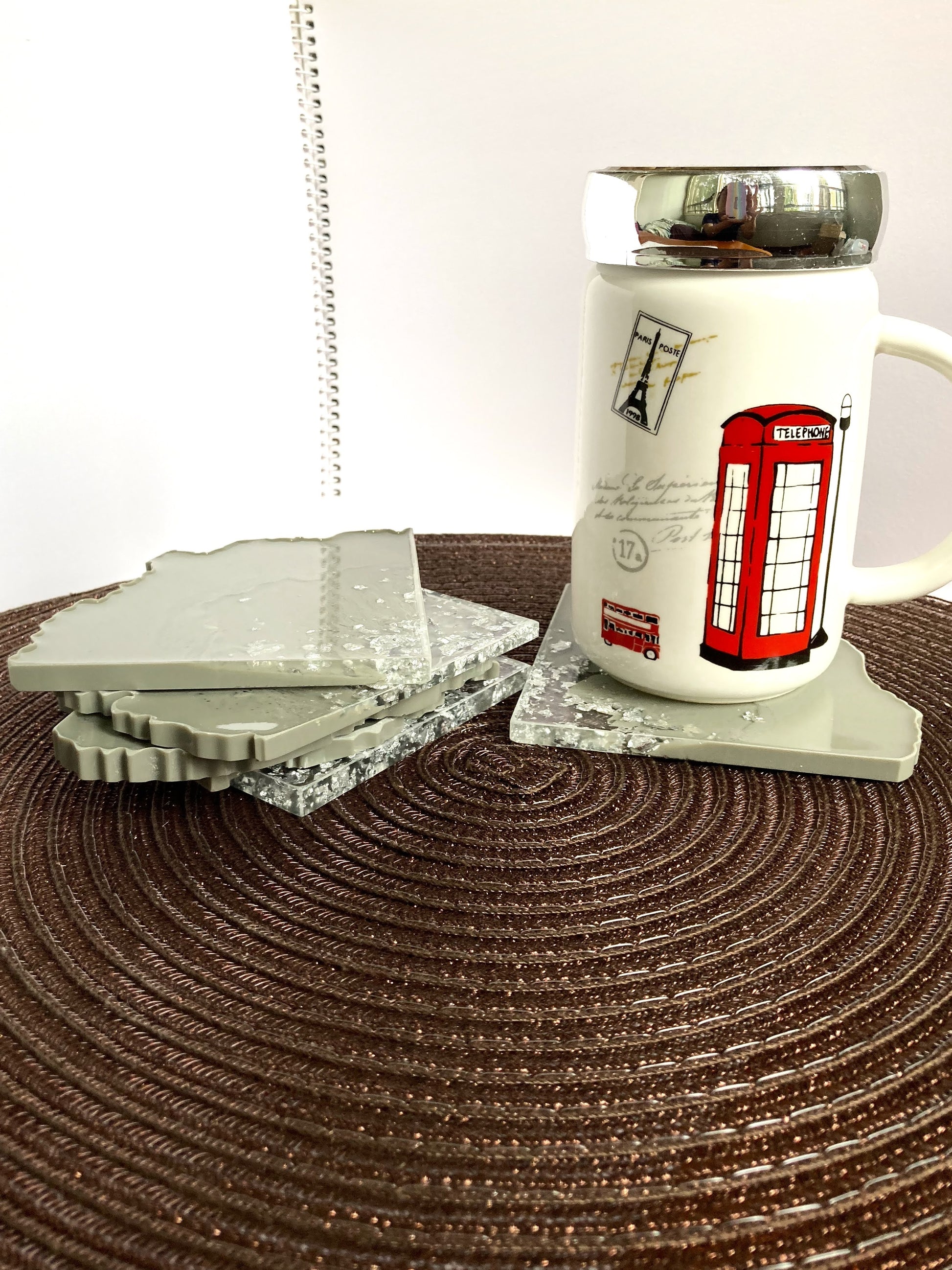 Square grey and silver resin coasters with marble finish